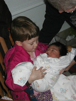Lauren holding Meztli (2days old)